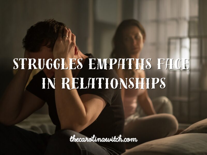 Struggles empaths face in relationships blog post titles with a picture of a couple sitting on a bed. The man is facing away from the woman holding his head in his hands. The woman is looking at him. It appears that they have been arguing.